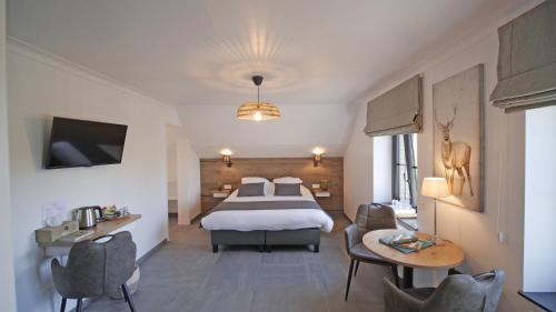 Imagen de la habitación del Hotel Logis Restaurant la Hutte Lurette. Foto 11
