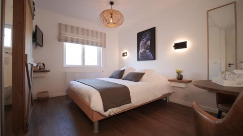 Imagen de la habitación del Hotel Logis Restaurant la Hutte Lurette. Foto 15