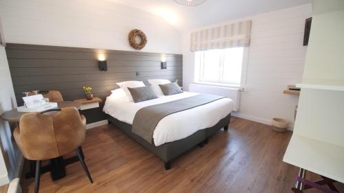 Imagen de la habitación del Hotel Logis Restaurant la Hutte Lurette. Foto 17