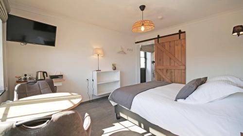 Imagen de la habitación del Hotel Logis Restaurant la Hutte Lurette. Foto 18
