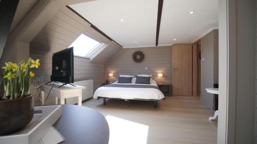 Imagen de la habitación del Hotel Logis Restaurant la Hutte Lurette. Foto 20
