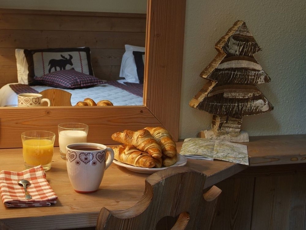 Imagen de la habitación del Hotel Logis la Tourmaline. Foto 4