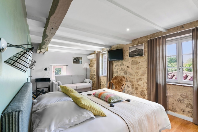 Imagen de la habitación del Hotel Logis s - Et Restaurant La Ferme De Flaran. Foto 7