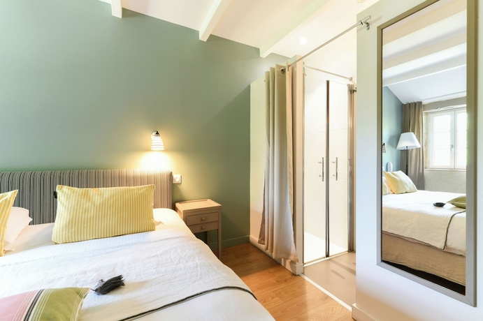 Imagen de la habitación del Hotel Logis s - Et Restaurant La Ferme De Flaran. Foto 9