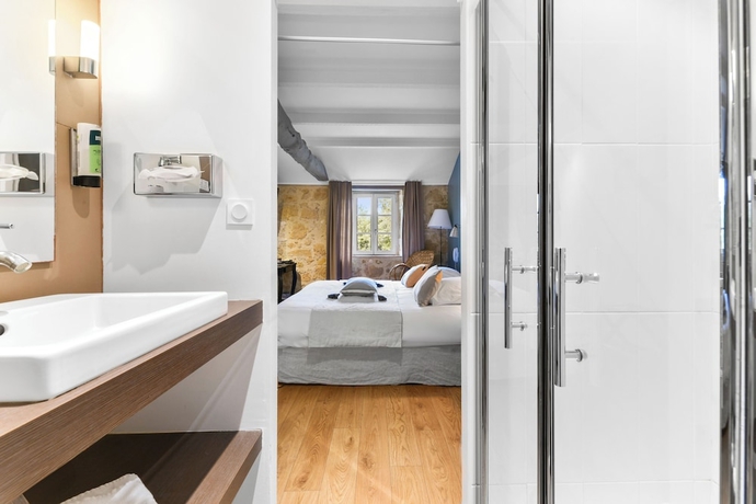 Imagen de la habitación del Hotel Logis s - Et Restaurant La Ferme De Flaran. Foto 10