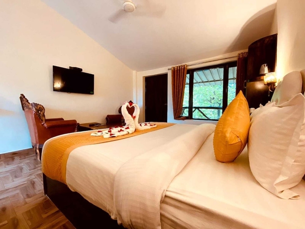 Imagen de la habitación del Hotel Lohagarh Corbett Resort. Foto 11
