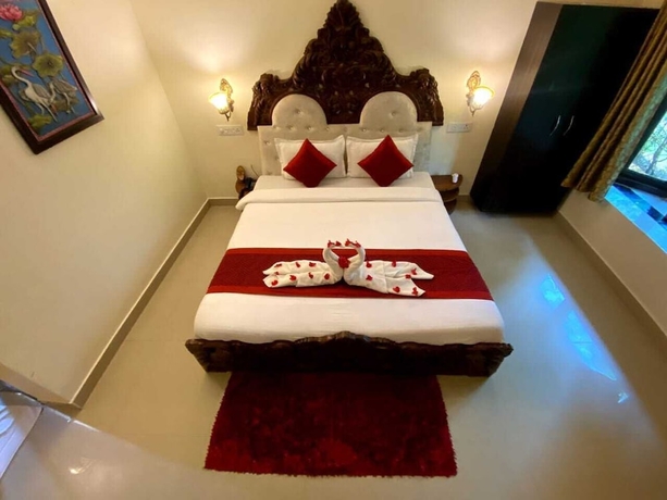 Imagen de la habitación del Hotel Lohagarh Corbett Resort. Foto 13