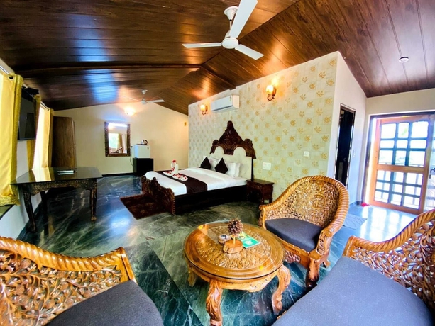 Imagen de la habitación del Hotel Lohagarh Corbett Resort. Foto 15