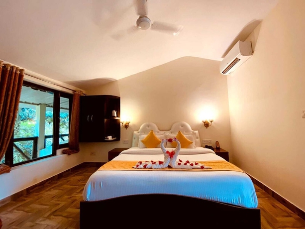 Imagen de la habitación del Hotel Lohagarh Corbett Resort. Foto 18