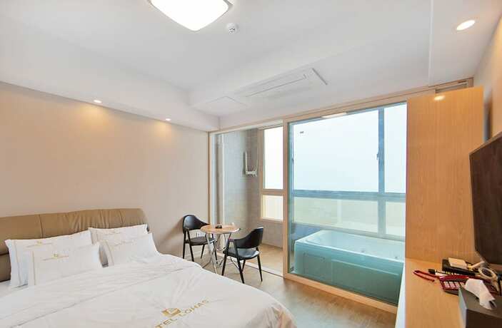 Imagen de la habitación del Hotel Lohas. Foto 16