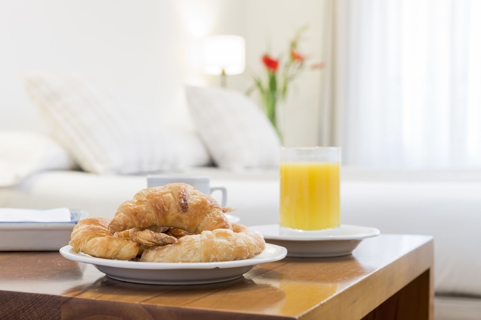 Imagen de la habitación del Hotel Loi Suites Arenales. Foto 11