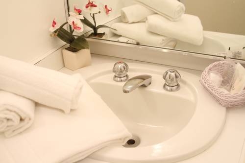 Imagen de la habitación del Hotel Loi Suites Belgrano. Foto 12