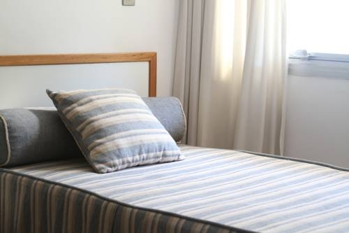 Imagen de la habitación del Hotel Loi Suites Belgrano. Foto 13