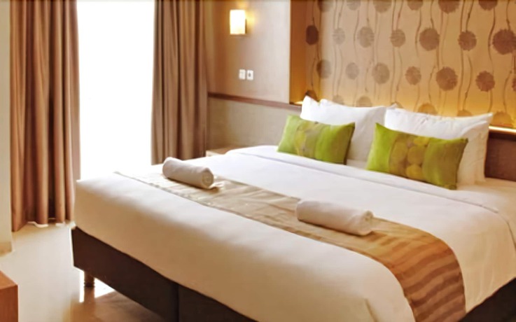 Imagen de la habitación del Hotel Loji Solo. Foto 10
