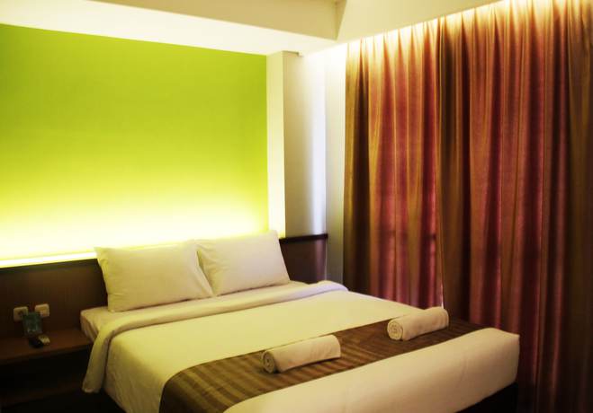 Imagen de la habitación del Hotel Loji Solo. Foto 11