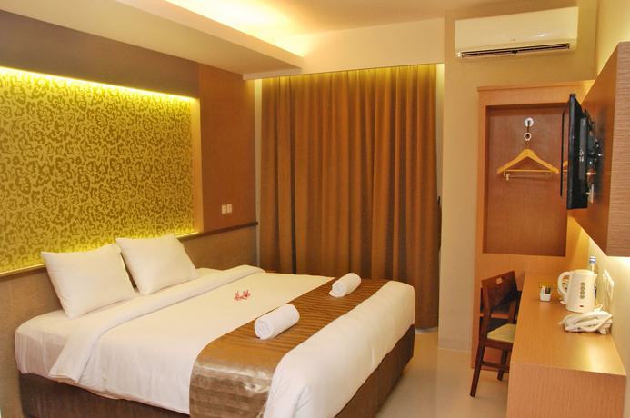 Imagen de la habitación del Hotel Loji Solo. Foto 13