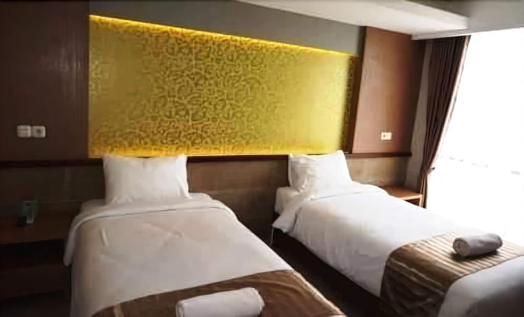 Imagen de la habitación del Hotel Loji Solo. Foto 14