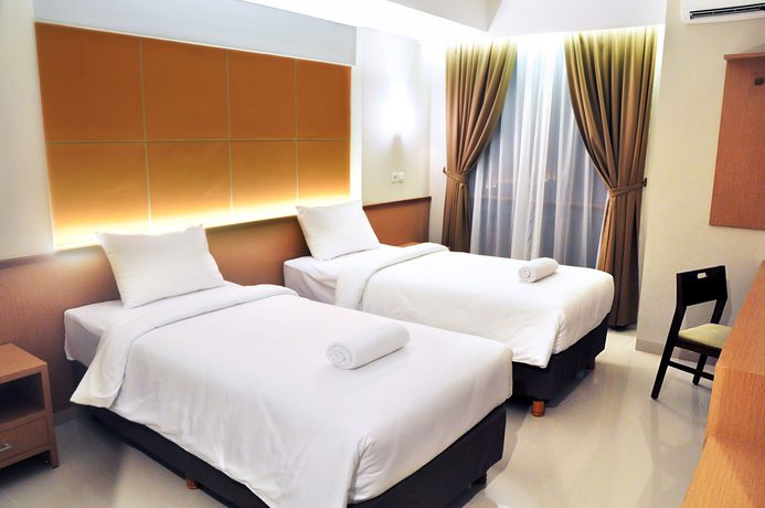 Imagen de la habitación del Hotel Loji Solo. Foto 15