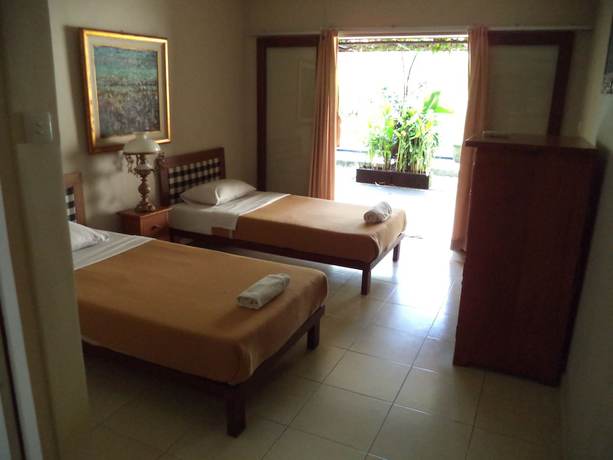 Imagen de la habitación del Hotel Lokasari Bungalows Spa and Gallery. Foto 5