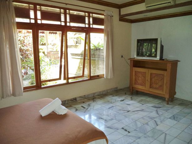 Imagen de la habitación del Hotel Lokasari Bungalows Spa and Gallery. Foto 6