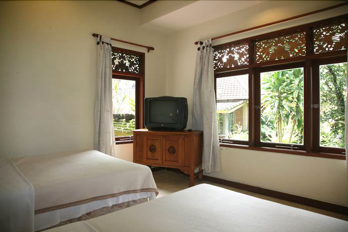 Imagen de la habitación del Hotel Lokasari Bungalows Spa and Gallery. Foto 8