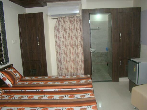 Imagen de la habitación del Hotel Lokhit Residency. Foto 14