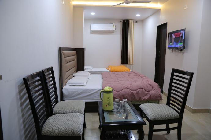 Imagen de la habitación del Hotel Lokpriya Inn. Foto 13