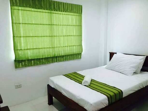 Imagen de la habitación del Hotel Lola Natividad. Foto 14