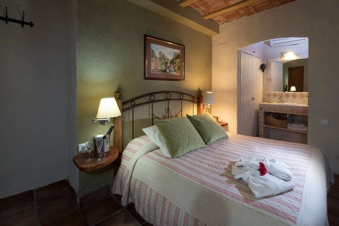 Imagen de la habitación del Hotel L'olivera. Foto 14