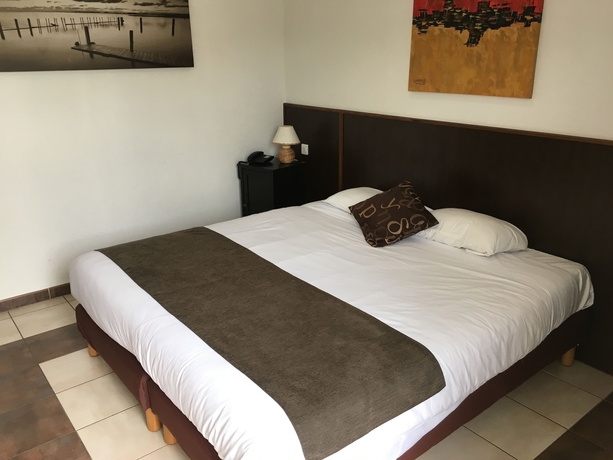 Imagen de la habitación del Hotel L'oliveraie. Foto 10