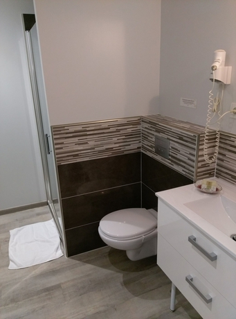 Imagen de la habitación del Hotel L'oliveraie. Foto 17