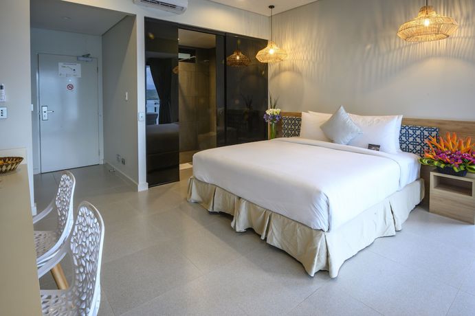 Imagen de la habitación del Hotel Loloata Island Resort. Foto 11