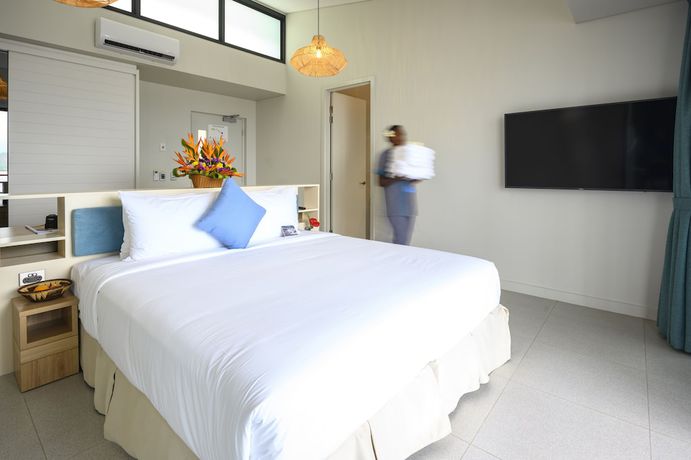 Imagen de la habitación del Hotel Loloata Island Resort. Foto 12