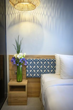 Imagen de la habitación del Hotel Loloata Island Resort. Foto 14