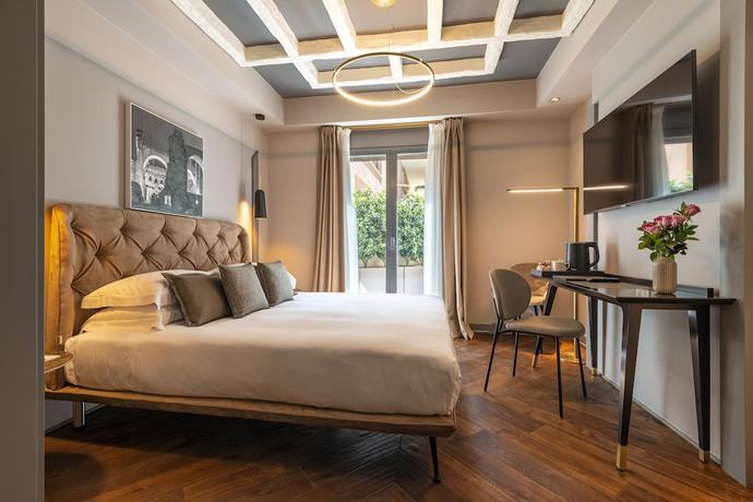 Imagen de la habitación del Hotel Loly Boutique. Foto 13