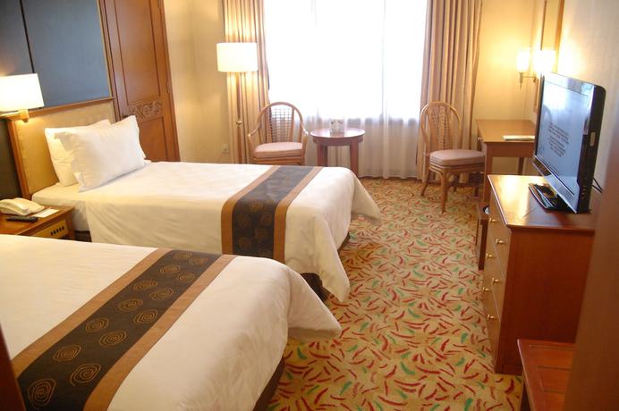 Imagen de la habitación del Hotel Loman Park Yogyakarta. Foto 8