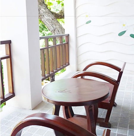 Imagen de la habitación del Hotel Lomtalay Chalet Resort. Foto 9
