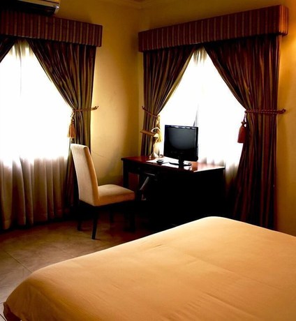 Imagen de la habitación del Hotel Londa, Rumuepirikom. Foto 7