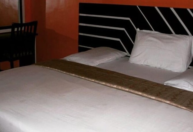 Imagen de la habitación del Hotel Londa, Rumuepirikom. Foto 11