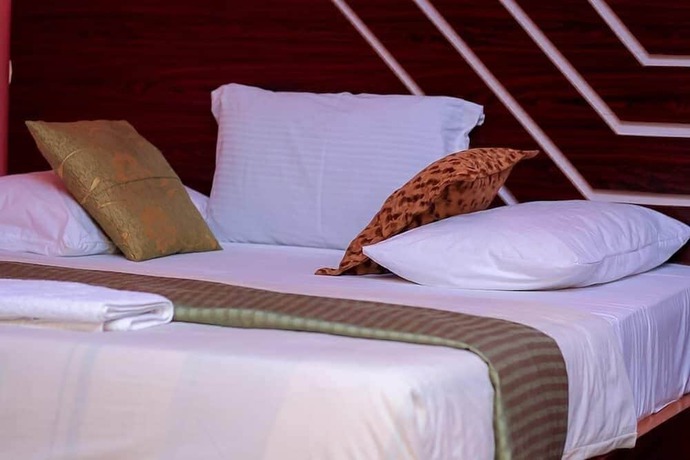 Imagen de la habitación del Hotel Londa, Rumuepirikom. Foto 13