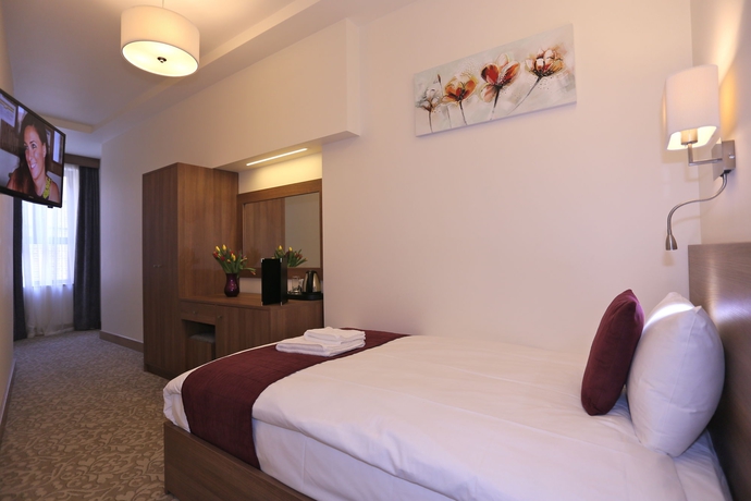 Imagen de la habitación del Hotel London King's. Foto 3