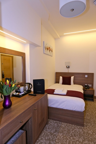 Imagen de la habitación del Hotel London King's. Foto 4