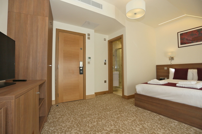 Imagen de la habitación del Hotel London King's. Foto 6