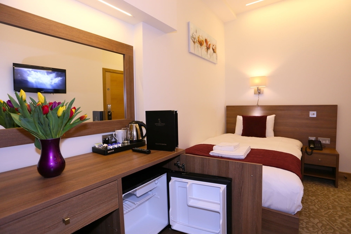 Imagen de la habitación del Hotel London King's. Foto 11