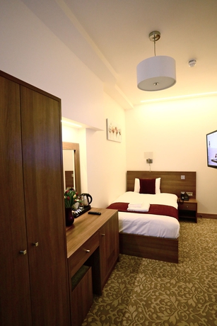Imagen de la habitación del Hotel London King's. Foto 12