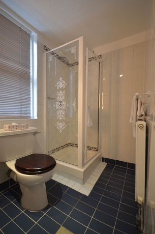 Imagen de la habitación del Hotel London Lodge. Foto 9