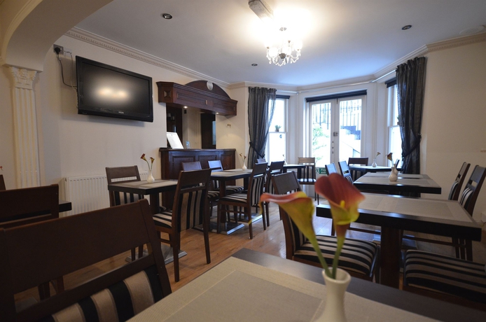 Imagen del bar/restaurante del Hotel London Lodge. Foto 2