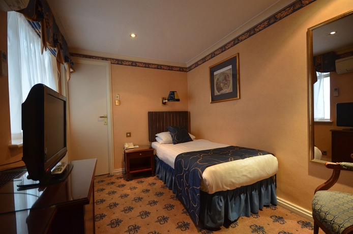 Imagen de la habitación del Hotel London Lodge. Foto 10