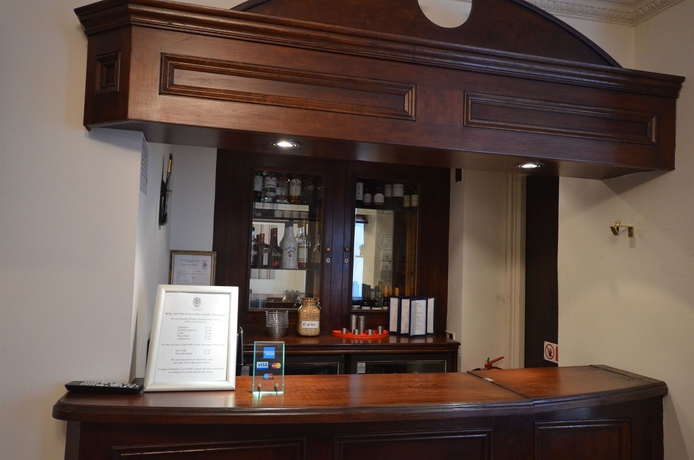 Imagen del bar/restaurante del Hotel London Lodge. Foto 4