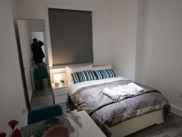 Imagen de la habitación del Hotel London Queens Apartments. Foto 18